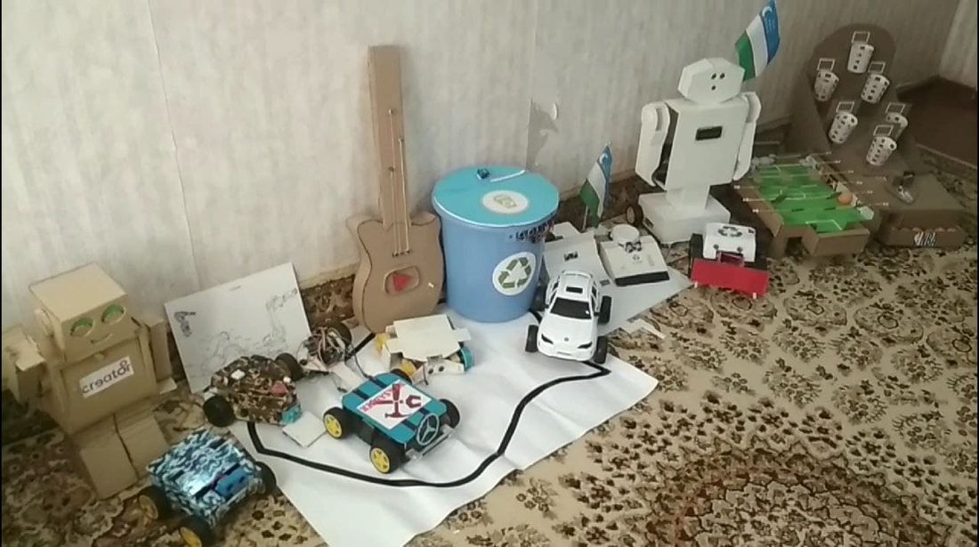 Lineup of Asadbek's early home-built robots